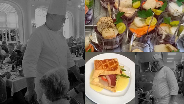 Une photo en noir et blanc d’un chef préparant des plats dans un restaurant.