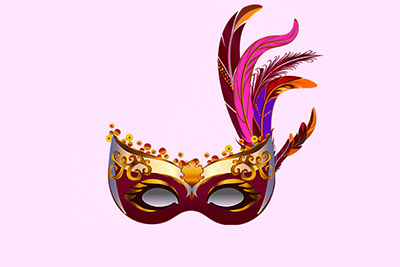 Un masque de carnaval avec des plumes sur fond rose.