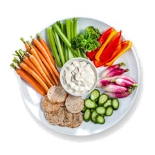 Une assiette de légumes et trempette sur un fond blanc adaptée à la restauration pour établissements accueillant des personnes en situation de handicap.