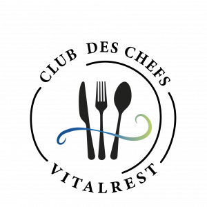 Un logo avec une fourchette et une cuillère sur fond noir.